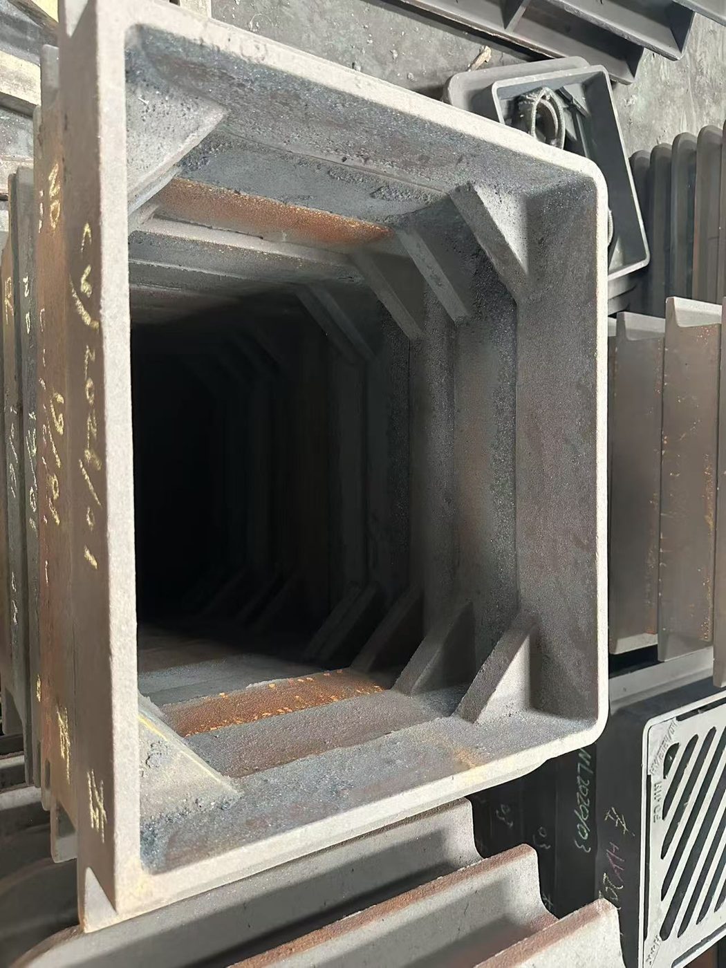 Cored hollow box-section casting — internal ribbing, as-cast