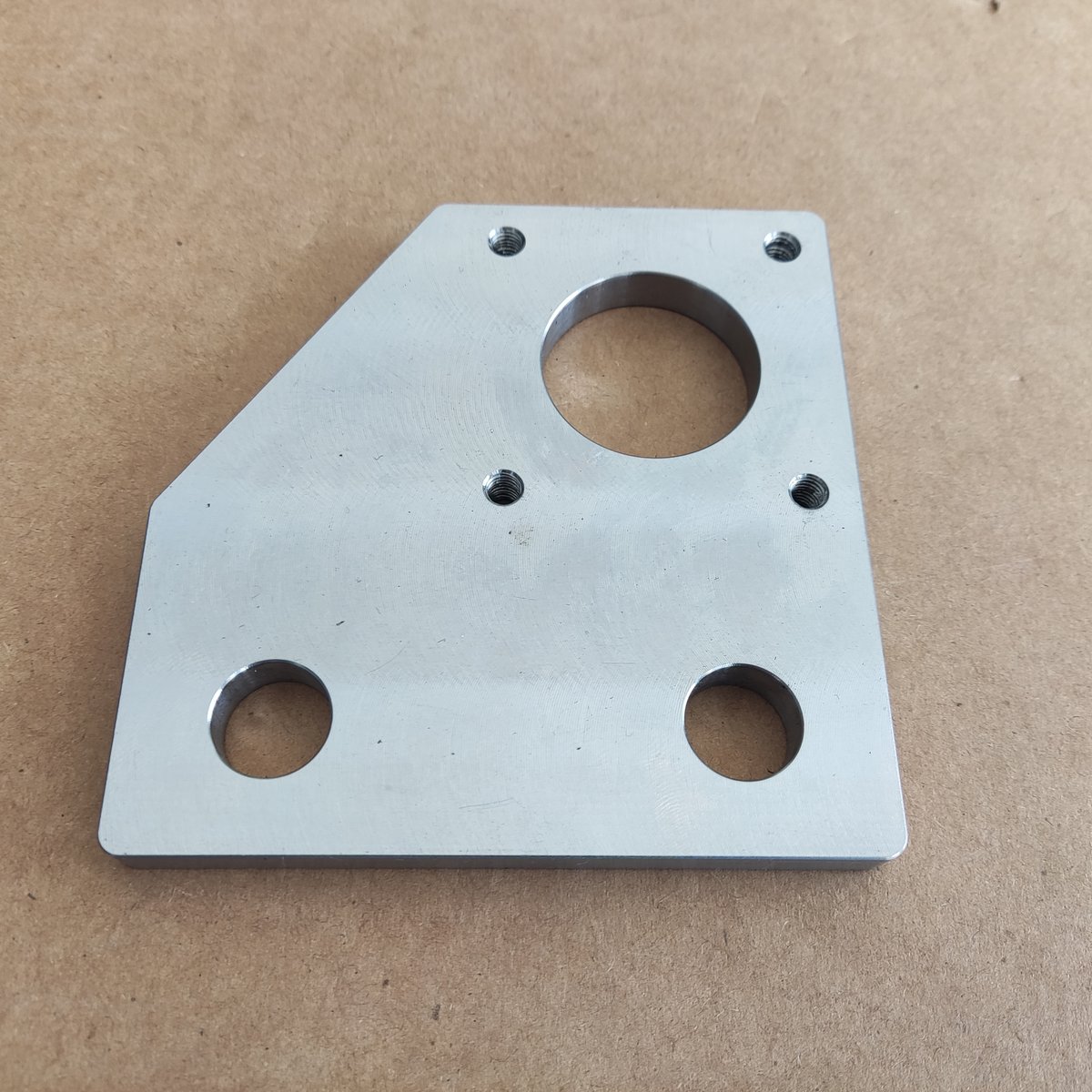 Stainless mounting plate — milled, drilled, tapped