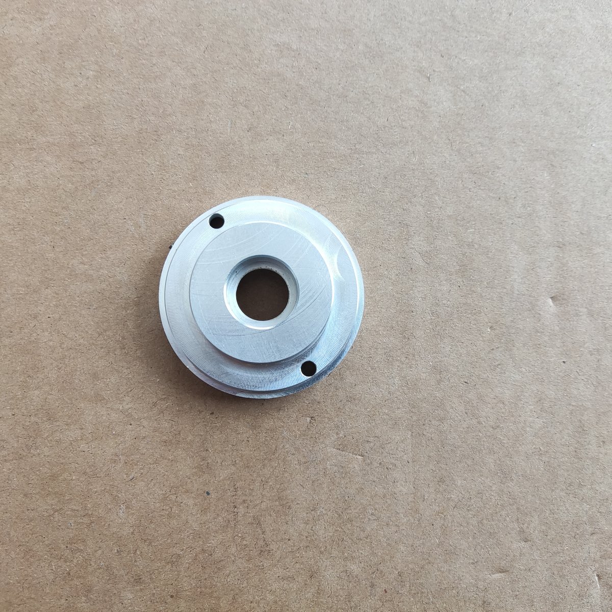 Aluminium turned hub with side ports