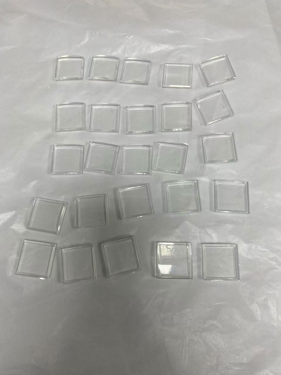 Machined clear acrylic blocks — optical-grade finish
